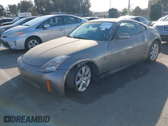 2004 Nissan 350Z Touring with VIN JN1AZ34E84T060682, listed as a IAAI auction lot 41616199 with 209,814 mi miles. Bid and sale history available at carsss.com. Image 2.