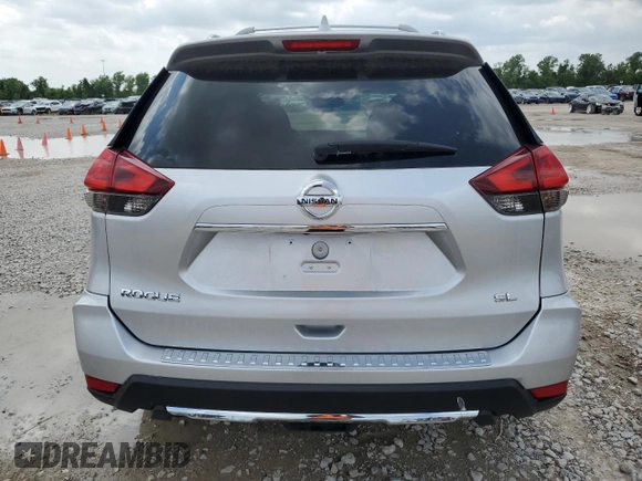 2017 Nissan Rogue S with VIN 5N1AT2MT2HC861133, listed as a Copart auction lot 54749085 with 86,705 mi miles and Salvage title. Bid and sale history available at DreamBid. Image 6.