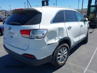 2018 Kia Sorento LX with VIN 5XYPG4A52JG354741, listed as a IAAI auction lot 41626561 with 91,242 mi miles and . Bid and sale history available at DreamBid. Image 4.