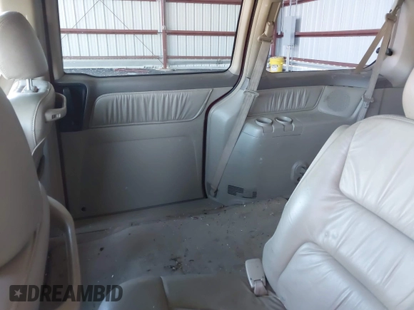 2004 Honda Odyssey EX-L with VIN 5FNRL18994B048661, listed as a IAAI auction lot 41758209 with 295,737 mi miles and . Bid and sale history available at DreamBid. Image 8.
