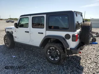 2025 Jeep Wrangler Rubicon with VIN 1C4PJXFN2SW525858, listed as a Copart auction lot 57415905 with 7,802 mi miles and Salvage title. Bid and sale history available at DreamBid. Image 2.
