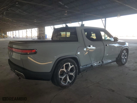 2022 Rivian R1T Adventure Package with VIN 7FCTGAAA3NN014291, listed as a Copart auction lot 76587044 with 0 mi miles and Salvage Title. Bid and sale history available at carsss.com. Image 3.