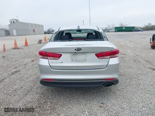2018 Kia Optima LX with VIN 5XXGT4L38JG179861, listed as a IAAI auction lot 42000255 with 87,530 mi miles. Bid and sale history available at carsss.com. Image 16.