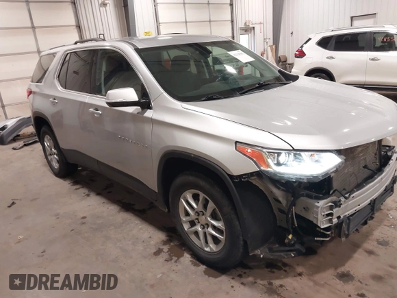 2018 Chevrolet Traverse LT Cloth z VIN 1GNEVGKW9JJ144070, wystawiony jako IAAI lot #42118002 z przebiegiem 142 006 mil mil oraz . Historia ofert i sprzedaży dostępna na DreamBid. Obrazek 1.