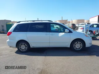2010 Toyota Sienna XLE with VIN 5TDYK4CC3AS336590, listed as a IAAI auction lot 41798194 with 230,707 mi miles. Bid and sale history available at carsss.com. Image 13.