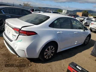 2022 Toyota Corolla Hybrid LE with VIN JTDEAMDE4NJ042155, listed as a Copart auction lot 53845215 with 28,254 mi miles and Salvage Title. Bid and sale history available at carsss.com. Image 3.