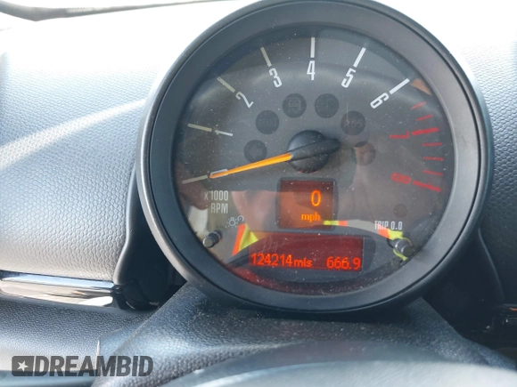 2015 MINI Countryman S with VIN WMWZC3C58FWT05613, listed as a IAAI auction lot 42374870 with 124,214 mi miles and . Bid and sale history available at DreamBid. Image 7.