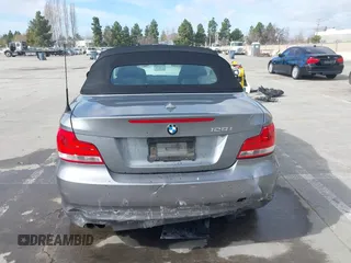 2012 BMW 1 Series 128i with VIN WBAUN1C52CVR00421, listed as a IAAI auction lot 41594256 with 107,957 mi miles and . Bid and sale history available at DreamBid. Image 16.