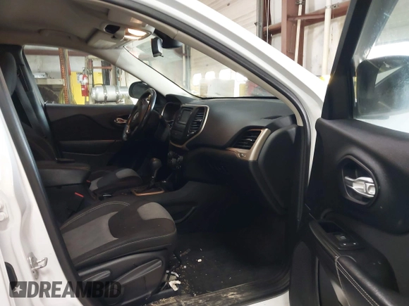 2014 Jeep Cherokee Latitude with VIN 1C4PJMCS5EW288909, listed as a IAAI auction lot 41531117 with 108,971 mi miles and . Bid and sale history available at DreamBid. Image 5.