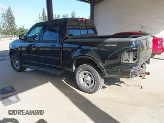 2002 Ford F-150 XLT with VIN 1FTRW08L92KD75087, listed as a IAAI auction lot 41960331 with 1 mi miles. Bid and sale history available at carsss.com. Image 3.