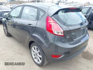 2018 Ford Fiesta SE with VIN 3FADP4EJ7JM127256, listed as a IAAI auction lot 41938121 with 83,211 mi miles. Bid and sale history available at carsss.com. Image 3.