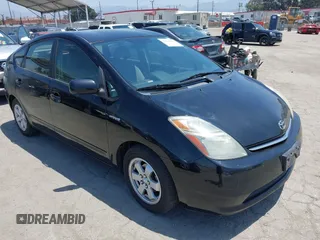 2007 Toyota Prius z VIN JTDKB20U773294216, wystawiony jako IAAI lot #42386453 z przebiegiem 169 799 mil mil oraz . Historia ofert i sprzedaży dostępna na DreamBid. Obrazek 1.