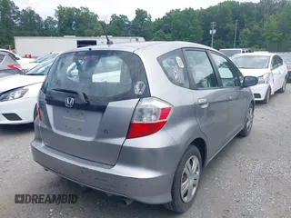 2010 Honda Fit z VIN JHMGE8H2XAS020698, wystawiony jako IAAI lot #42549063 z przebiegiem 260 454 mil mil oraz . Historia ofert i sprzedaży dostępna na DreamBid. Obrazek 4.