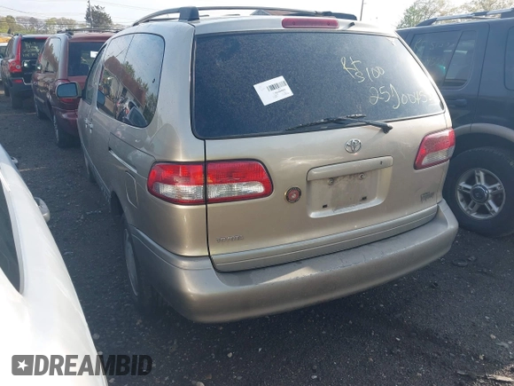 2002 Toyota Sienna LE with VIN 4T3ZF13C42U469088, listed as a IAAI auction lot 42184081 with Not provided miles and . Bid and sale history available at DreamBid. Image 3.