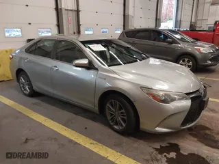 2015 Toyota Camry Hybrid LE with VIN 4T1BD1FK8FU144467, listed as a IAAI auction lot 40972231 with 106,247 mi miles. Bid and sale history available at carsss.com. Image 1.