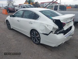 2017 Nissan Altima SR with VIN 1N4AL3APXHC152604, listed as a IAAI auction lot 41978787 with 104,268 mi miles and . Bid and sale history available at DreamBid. Image 3.
