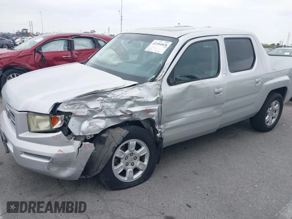 2006 Honda Ridgeline RTL with VIN 2HJYK16566H532598, listed as a IAAI auction lot 42184828 with 91,817 mi miles and . Bid and sale history available at DreamBid. Image 2.