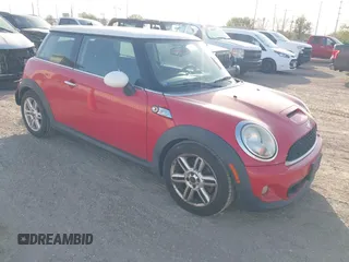 2013 MINI Hardtop S with VIN WMWSV3C56DT392499, listed as a IAAI auction lot 41855073 with 55,403 mi miles and . Bid and sale history available at DreamBid. Image 1.