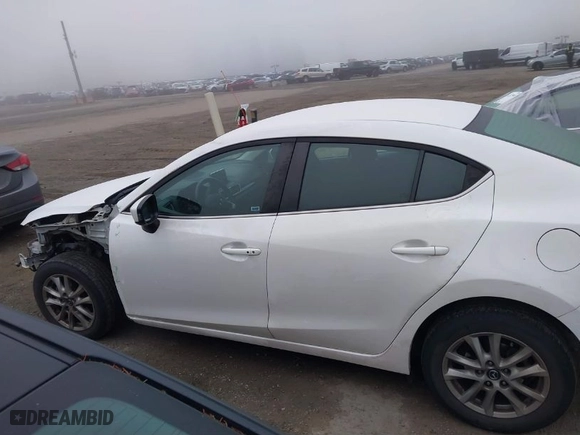 2015 Mazda Mazda3 i Touring with VIN 3MZBM1V76FM135365, listed as a IAAI auction lot 41317362 with 121,446 mi miles. Bid and sale history available at carsss.com. Image 15.