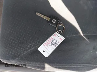 2010 Nissan Versa S z VIN 3N1BC1CP0AL358270, wystawiony jako IAAI lot #42203337 z przebiegiem 157 736 mil mil oraz . Historia ofert i sprzedaży dostępna na DreamBid. Obrazek 11.