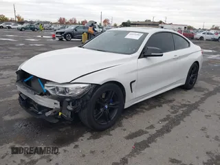 2014 BMW 4 Series 428i xDrive with VIN WBA3N5C56EK196702, listed as a IAAI auction lot 40934482 with 120,292 mi miles. Bid and sale history available at carsss.com. Image 2.