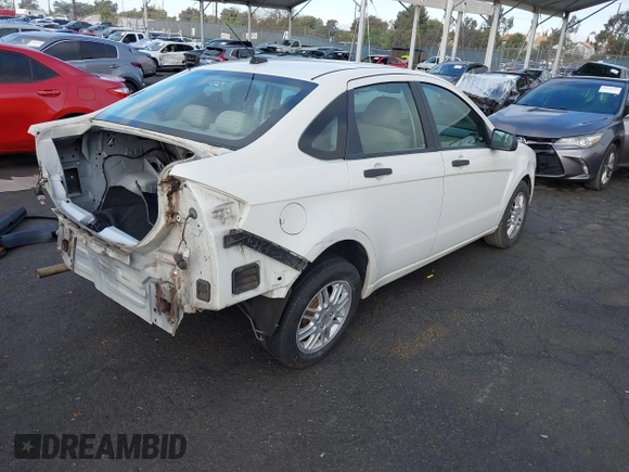 2010 Ford Focus SE with VIN 1FAHP3FN5AW146403, listed as a IAAI auction lot 40955575 with 128,243 mi miles. Bid and sale history available at carsss.com. Image 4.
