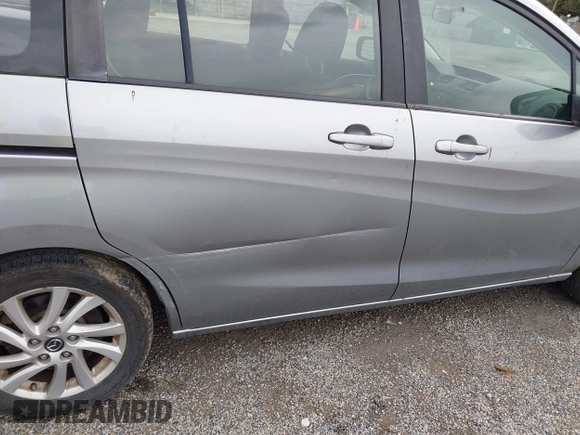 2014 Mazda 5 Sport z VIN JM1CW2BL5E0172594, wystawiony jako IAAI lot #42628707 z przebiegiem 180 369 mil mil oraz . Historia ofert i sprzedaży dostępna na DreamBid. Obrazek 19.