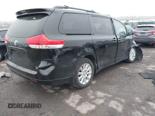 2014 Toyota Sienna Ltd with VIN 5TDDK3DCXES076542, listed as a IAAI auction lot 41559021 with 1 mi miles. Bid and sale history available at carsss.com. Image 4.