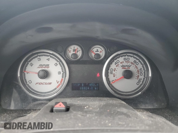 2009 Ford Focus SE with VIN 1FAHP35N39W258484, listed as a Copart auction lot 72679704 with 88,824 mi miles and Salvage Title. Bid and sale history available at DreamBid. Image 9.