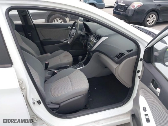 2012 Hyundai Accent GS with VIN KMHCT5AE4CU051716, listed as a IAAI auction lot 41692287 with 173,861 mi miles. Bid and sale history available at carsss.com. Image 5.