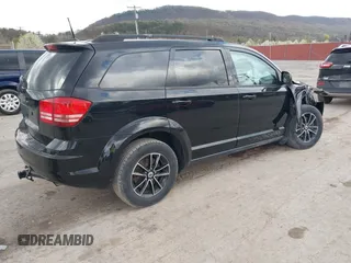 2018 Dodge Journey SE with VIN 3C4PDCAB1JT446005, listed as a IAAI auction lot 42001854 with 70,074 mi miles and . Bid and sale history available at DreamBid. Image 4.