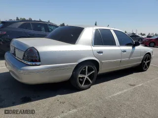 2004 Ford Crown Victoria LX with VIN 2FAFP74W44X184918, listed as a Copart auction lot 73346744 with 157,925 mi miles and Salvage Title. Bid and sale history available at carsss.com. Image 3.
