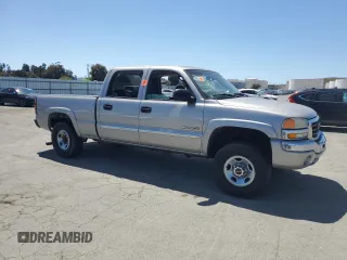 2004 GMC Sierra 2500 SLE z VIN 1GTGK23U64F211239, wystawiony jako Copart lot #54905465 z przebiegiem 193 492 mil mil oraz Szkody całkowita. Historia ofert i sprzedaży dostępna na DreamBid. Obrazek 4.