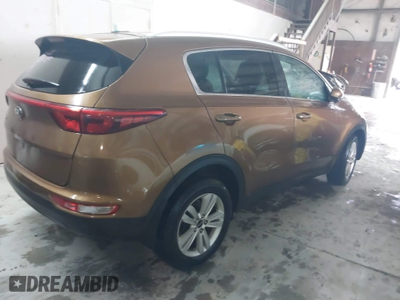 2018 Kia Sportage LX with VIN KNDPMCACXJ7446520, listed as a IAAI auction lot 41568985 with 79,601 mi miles and . Bid and sale history available at DreamBid. Image 4.