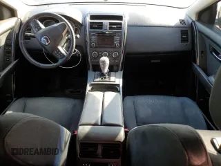 2015 Mazda CX-9 Sport с VIN JM3TB2BV2F0454150, выставлен на аукционе Copart как лот 68082694 с пробегом 166 758 миль миль и Чистый • Clean title. История ставок и продаж доступна на DreamBid. Изображение 8.