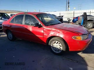 1997 Ford Escort LX with VIN 1FALP13P0VW399249, listed as a Copart auction lot 84476474 with 80,431 mi miles and Non Repairable. Bid and sale history available at carsss.com. Image 4.