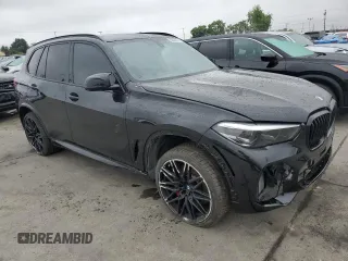 2021 BMW X5 M z VIN 5YMJU0C0XM9H13455, wystawiony jako Copart lot #59625375 z przebiegiem Nie podano mil oraz Szkoda całkowita • Salvage title. Historia ofert i sprzedaży dostępna na DreamBid. Obrazek 4.