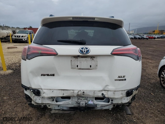 2016 Toyota RAV4 Hybrid XLE with VIN JTMRJREV9GD011790, listed as a Copart auction lot 88946245 with 104,035 mi miles and Salvage Title. Bid and sale history available at carsss.com. Image 6.