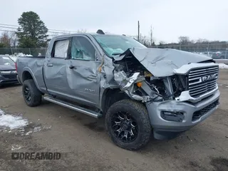 2022 Ram 2500 Laramie with VIN 3C6UR5FL8NG283134, listed as a IAAI auction lot 41300612 with 67,307 mi miles. Bid and sale history available at carsss.com. Image 1.