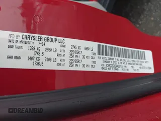 2014 Dodge Grand Caravan American Value with VIN 2C4RDGBG0ER452719, listed as a IAAI auction lot 41547145 with 151,636 mi miles and . Bid and sale history available at DreamBid. Image 9.