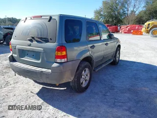 2007 Ford Escape XLT with VIN 1FMYU03Z07KA20616, listed as a IAAI auction lot 41567658 with 142,907 mi miles. Bid and sale history available at carsss.com. Image 4.
