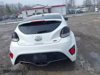 2016 Hyundai Veloster Turbo with VIN KMHTC6AE6GU275727, listed as a IAAI auction lot 41743920 with 94,893 mi miles. Bid and sale history available at carsss.com. Image 16.