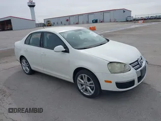 2008 Volkswagen Jetta Sedan S with VIN 3VWJZ71K58M075639, listed as a IAAI auction lot 41855222 with 142,902 mi miles. Bid and sale history available at carsss.com. Image 1.