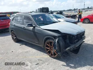 2015 BMW X1 sDrive28i with VIN WBAVM1C56FV314381, listed as a IAAI auction lot 41961245 with 68,182 mi miles. Bid and sale history available at carsss.com. Image 1.