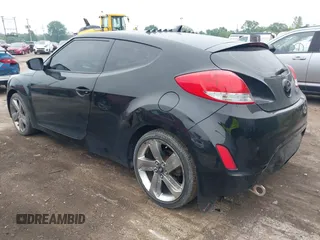 2013 Hyundai Veloster w/Black Int with VIN KMHTC6AD7DU170049, listed as a IAAI auction lot 42441737 with 101,924 mi miles and . Bid and sale history available at DreamBid. Image 3.