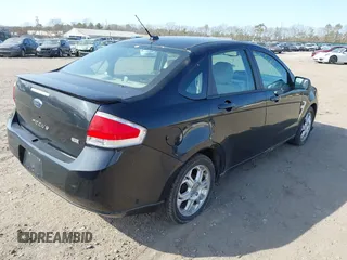 2008 Ford Focus SE with VIN 1FAHP35N68W278579, listed as a IAAI auction lot 41801538 with 999,999 mi miles. Bid and sale history available at carsss.com. Image 4.