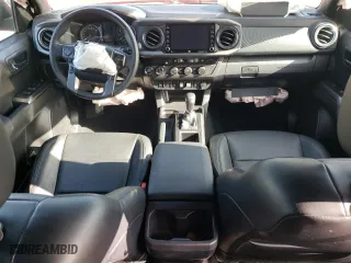 2022 Toyota Tacoma 4WD SR with VIN 3TMCZ5ANXNM514338, listed as a Copart auction lot 85986844 with 21,604 mi miles and Salvage Title. Bid and sale history available at carsss.com. Image 8.