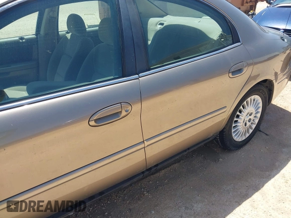2003 Mercury Sable GS z VIN 1MEFM50U23A601955, wystawiony jako IAAI lot #42197171 z przebiegiem 94 977 mil mil oraz . Historia ofert i sprzedaży dostępna na DreamBid. Obrazek 12.