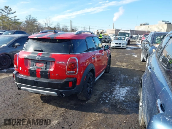 2019 MINI Countryman Cooper S with VIN WMZYT5C57K3E69637, listed as a IAAI auction lot 41379982 with 100,891 mi miles. Bid and sale history available at carsss.com. Image 4.