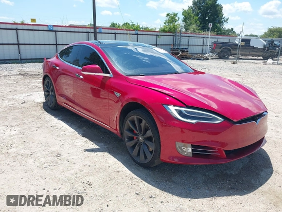 2016 Tesla Model S 90D with VIN 5YJSA1E48GF144821, listed as a IAAI auction lot 42206473 with 129,624 mi miles and . Bid and sale history available at DreamBid. Image 1.